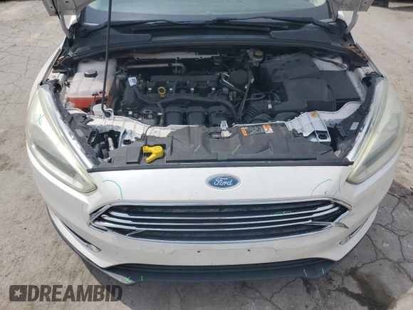 2015 Ford Focus Titanium с VIN 1FADP3J26FL333542, выставлен на аукционе Copart как лот 59855315 с пробегом 116 763 миль миль и Чистый • Clean title. История ставок и продаж доступна на DreamBid. Изображение 11.