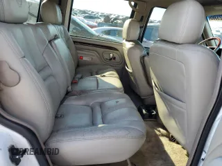 1999 Cadillac Escalade z VIN 1GYEK13R3XR406970, wystawiony jako Copart lot #87623365 z przebiegiem 189 339 mil mil oraz Szkoda całkowita • Salvage title. Historia ofert i sprzedaży dostępna na DreamBid. Obrazek 11.