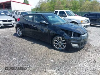 2014 Hyundai Veloster RE:FLEX with VIN KMHTC6AD2EU212693, listed as a IAAI auction lot 42140945 with 118,884 mi miles and . Bid and sale history available at DreamBid. Image 1.