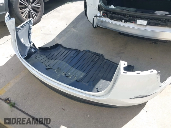 2024 Tesla Model Y with VIN 7SAYGDED2RF017448, listed as a IAAI auction lot 41597056 with 9,702 mi miles and . Bid and sale history available at DreamBid. Image 11.