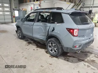 2022 Honda Passport TrailSport with VIN 5FNYF8H68NB003147, listed as a IAAI auction lot 41269006 with 61,026 mi miles and . Bid and sale history available at DreamBid. Image 3.