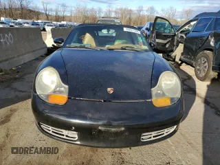2000 Porsche Boxster z VIN WP0CA2980YU626358, wystawiony jako Copart lot #36977344 z przebiegiem 117 561 mil mil oraz Szkoda całkowita • Salvage title. Historia ofert i sprzedaży dostępna na DreamBid. Obrazek 5.