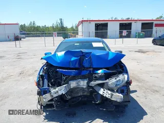2018 Honda Civic LX with VIN 19XFC2F54JE027744, listed as a IAAI auction lot 42038398 with 119,250 mi miles and . Bid and sale history available at DreamBid. Image 6.
