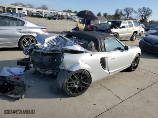 2002 Toyota MR2 Spyder with VIN JTDFR320620048426, listed as a Copart auction lot 88367235 with 98,380 mi miles and Salvage Title. Bid and sale history available at carsss.com. Image 3.