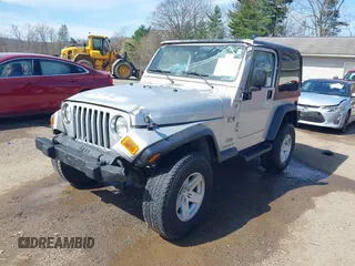 2006 Jeep Wrangler X with VIN 1J4FA39S16P787614, listed as a IAAI auction lot 41992315 with 61,788 mi miles. Bid and sale history available at carsss.com. Image 2.