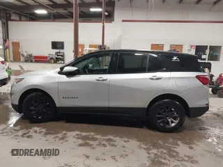 2018 Chevrolet Equinox LT z VIN 2GNAXSEV6J6198809, wystawiony jako IAAI lot #41945758 z przebiegiem 196 485 mil mil oraz . Historia ofert i sprzedaży dostępna na DreamBid. Obrazek 15.