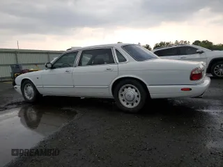 1999 Jaguar XJ with VIN SAJKD6041XC876928, listed as a Copart auction lot 60038405 with 63,917 mi miles and Clean title. Bid and sale history available at DreamBid. Image 2.