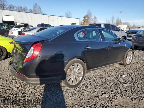 2014 Lincoln MKS EcoBoost with VIN 1LNHL9FT2EG600500, listed as a Copart auction lot 83764694 with 74,949 mi miles and Salvage title. Bid and sale history available at DreamBid. Image 3.
