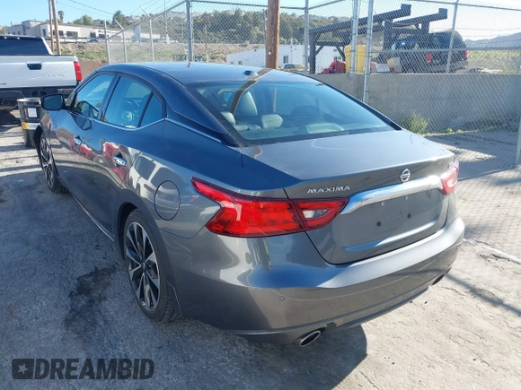 2018 Nissan Maxima Platinum z VIN 1N4AA6AP7JC392710, wystawiony jako IAAI lot #41866951 z przebiegiem 49 026 mil mil oraz . Historia ofert i sprzedaży dostępna na DreamBid. Obrazek 3.