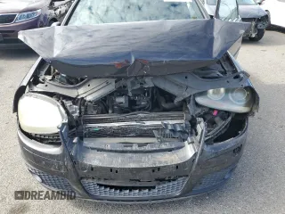 2007 Volkswagen GTI z VIN WVWFV71K47W055627, wystawiony jako Copart lot #47671155 z przebiegiem 141 746 mil mil oraz Szkoda całkowita • Salvage title. Historia ofert i sprzedaży dostępna na DreamBid. Obrazek 11.