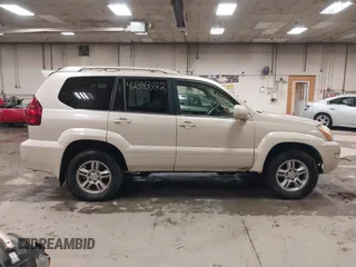 2003 Lexus GX 470 z VIN JTJBT20X930010939, wystawiony jako IAAI lot #42343382 z przebiegiem 294 100 mil mil oraz . Historia ofert i sprzedaży dostępna na DreamBid. Obrazek 13.