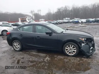 2014 Mazda 3 i Grand Touring with VIN JM1BM1W79E1155302, listed as a IAAI auction lot 41512501 with 98,635 mi miles and . Bid and sale history available at DreamBid. Image 13.