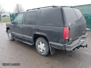 1999 Chevrolet Tahoe Z71 with VIN 1GNEK13R9XJ515820, listed as a IAAI auction lot 42004125 with 251,184 mi miles. Bid and sale history available at carsss.com. Image 3.