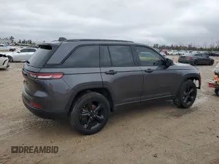 2023 Jeep Grand Cherokee Altitude with VIN 1C4RJGAG7PC573429, listed as a Copart auction lot 42961295 with 9,704 mi miles and Salvage title. Bid and sale history available at DreamBid. Image 3.