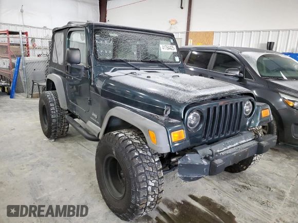 2006 Jeep Wrangler SE with VIN 1J4FA29S36P724699, listed as a Copart auction lot 41764425 with 129,016 mi miles and Salvage Title. Bid and sale history available at carsss.com. Image 4.