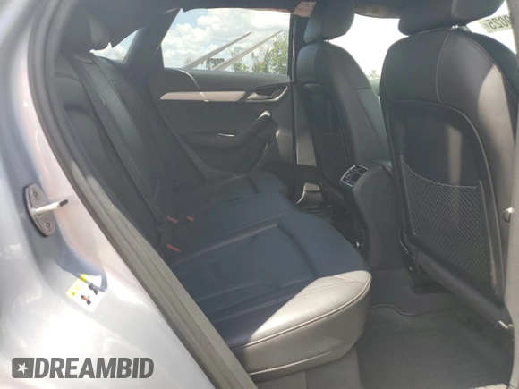 2018 Audi Q3 Premium z VIN WA1BCCFS0JR013087, wystawiony jako Copart lot #61509025 z przebiegiem 46 374 mil mil oraz Nie do naprawy • Non repairable. Historia ofert i sprzedaży dostępna na DreamBid. Obrazek 11.