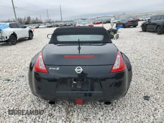 2014 Nissan 370Z Touring with VIN JN1AZ4FH1EM620177, listed as a Copart auction lot 42581255 with 106,957 mi miles and Salvage Title. Bid and sale history available at DreamBid. Image 6.