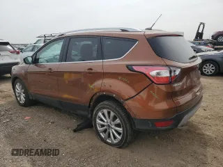 2017 Ford Escape Titanium with VIN 1FMCU0JD4HUC85921, listed as a Copart auction lot 51490945 with 90,093 mi miles and Salvage Title. Bid and sale history available at carsss.com. Image 2.