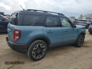 2022 Ford Bronco Sport Outer Banks z VIN 3FMCR9C61NRD00690, wystawiony jako Copart lot #61822235 z przebiegiem 10 635 mil mil oraz Czysty tytuł • Clean title. Historia ofert i sprzedaży dostępna na DreamBid. Obrazek 3.