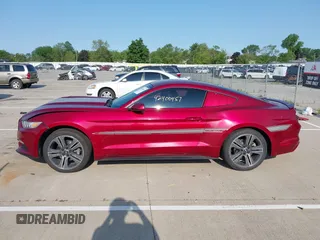 2017 Ford Mustang V6 z VIN 1FA6P8AMXH5226346, wystawiony jako IAAI lot #42400457 z przebiegiem 147 953 mil mil oraz . Historia ofert i sprzedaży dostępna na DreamBid. Obrazek 14.