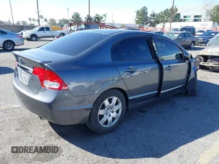 2009 Honda Civic LX z VIN 19XFA16539E021784, wystawiony jako IAAI lot #41674944 z przebiegiem 52 474 mil mil oraz . Historia ofert i sprzedaży dostępna na DreamBid. Obrazek 4.