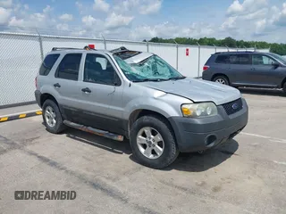 2005 Ford Escape XLT with VIN 1FMYU93175KD10184, listed as a IAAI auction lot 42559966 with 244,499 mi miles and . Bid and sale history available at DreamBid. Image 1.