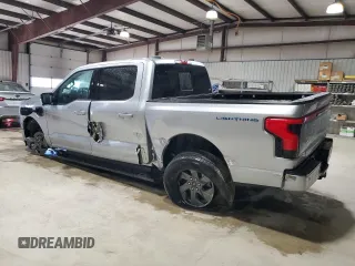 2024 Ford F-150 Lightning Lariat z VIN 1FT6W5L74RWG04451, wystawiony jako Copart lot #86058664 z przebiegiem 2 232 mil mil oraz Szkoda całkowita • Salvage title. Historia ofert i sprzedaży dostępna na DreamBid. Obrazek 2.