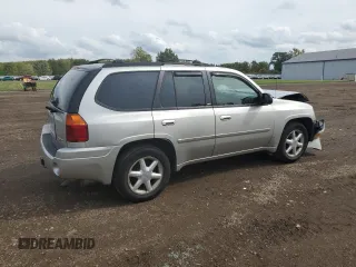 2007 GMC Envoy SLT with VIN 1GKDT13S272265100, listed as a Copart auction lot 73136264 with 245,198 mi miles and Salvage Title. Bid and sale history available at carsss.com. Image 3.