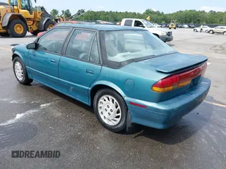 1995 Saturn SL with VIN 1G8ZK5271SZ147168, listed as a IAAI auction lot 42480978 with 159,136 mi miles and . Bid and sale history available at DreamBid. Image 3.