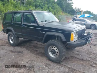 1987 Jeep Cherokee z VIN 1JCMR7819HT174249, wystawiony jako IAAI lot #42458110 z przebiegiem 157 683 mil mil oraz . Historia ofert i sprzedaży dostępna na DreamBid. Obrazek 1.