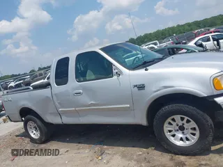 2000 Ford F-150 XL with VIN 1FTRX18L1YNA13975, listed as a IAAI auction lot 42397187 with 235,471 mi miles and . Bid and sale history available at DreamBid. Image 13.