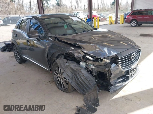 2017 Mazda CX-3 Grand Touring z VIN JM1DKFD70H0150496, wystawiony jako IAAI lot #41746038 z przebiegiem 108 091 mil mil oraz . Historia ofert i sprzedaży dostępna na DreamBid. Obrazek 1.