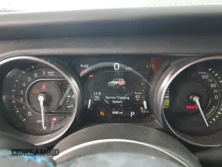 2023 Jeep Wrangler Rubicon z VIN 1C4JJXR6XPW663181, wystawiony jako Copart lot #49799125 z przebiegiem 8 085 mil mil oraz Szkoda całkowita • Salvage title. Historia ofert i sprzedaży dostępna na DreamBid. Obrazek 9.