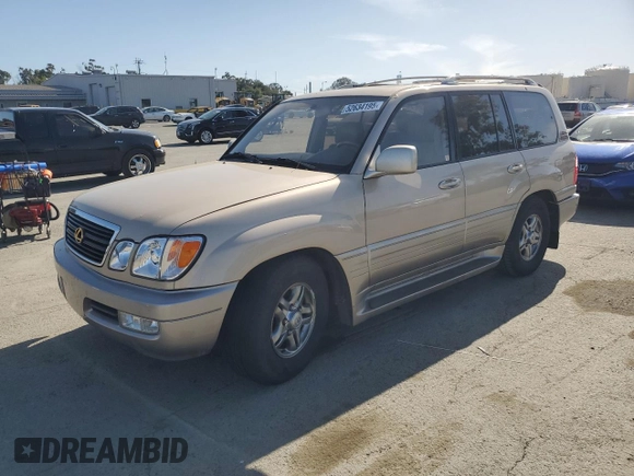2001 Lexus LX 470 z VIN JTJHT00W213507042, wystawiony jako Copart lot #52634195 z przebiegiem 179 707 mil mil oraz Tytuł czysty. Historia ofert i sprzedaży dostępna na DreamBid. Obrazek 1.