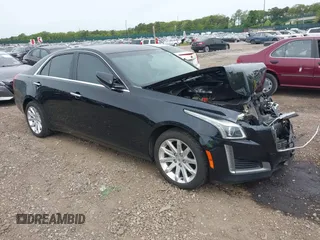2014 Cadillac CTS AWD z VIN 1G6AW5SX6E0175566, wystawiony jako IAAI lot #42350632 z przebiegiem 41 610 mil mil oraz . Historia ofert i sprzedaży dostępna na DreamBid. Obrazek 1.