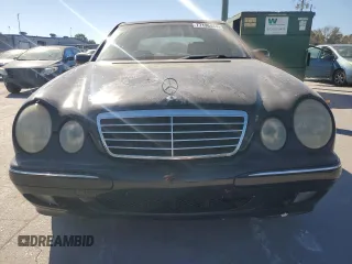 2000 Mercedes-Benz E-Class with VIN WDBJF70JXYB091085, listed as a Copart auction lot 77136484 with 185,429 mi miles and Salvage Title. Bid and sale history available at carsss.com. Image 5.