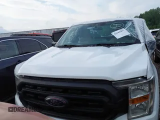 2021 Ford F-150 XL with VIN 1FTMF1CB5MKE25341, listed as a IAAI auction lot 42103478 with 125,369 mi miles and . Bid and sale history available at DreamBid. Image 12.