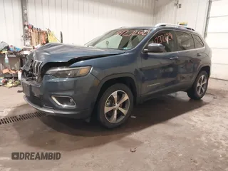 2020 Jeep Cherokee Limited with VIN 1C4PJMDX2LD516951, listed as a IAAI auction lot 41272629 with 99,717 mi miles and . Bid and sale history available at DreamBid. Image 2.