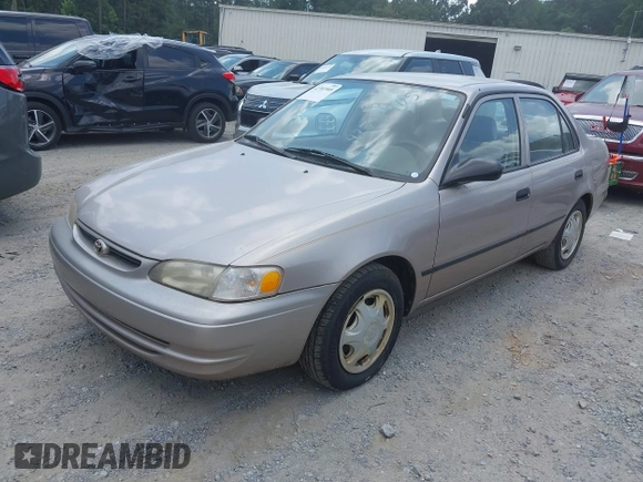 1998 Toyota Corolla VE with VIN 1NXBR12E0WZ051301, listed as a IAAI auction lot 42701905 with Not provided miles and . Bid and sale history available at DreamBid. Image 2.