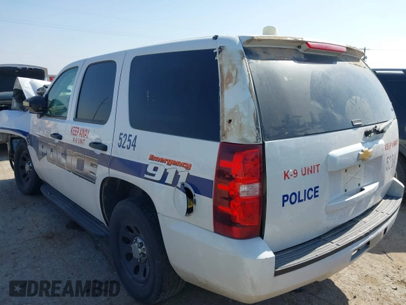 2012 Chevrolet Tahoe Commercial with VIN 1GNLC2E08CR285885, listed as a IAAI auction lot 42326129 with 100,035 mi miles and . Bid and sale history available at DreamBid. Image 3.