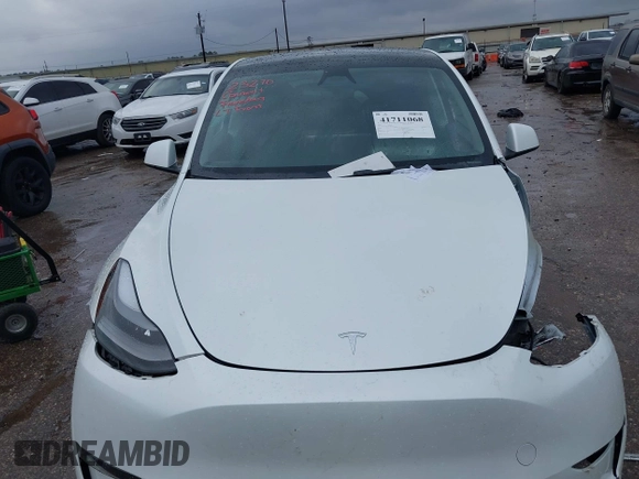 2023 Tesla Model Y Performance with VIN 7SAYGDEF7PF807312, listed as a IAAI auction lot 41711068 with 25,029 mi miles and . Bid and sale history available at DreamBid. Image 11.