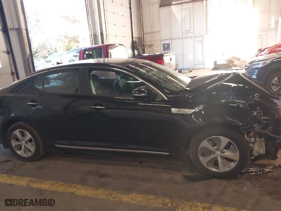 2015 Kia Optima Hybrid with VIN KNAGM4AD1F5083989, listed as a IAAI auction lot 41013875 with NaN miles. Bid and sale history available at carsss.com. Image 14.