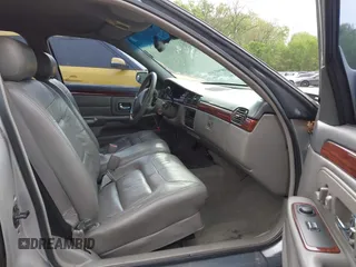 1999 Cadillac DeVille z VIN 1G6KD54Y6XU734741, wystawiony jako IAAI lot #42121114 z przebiegiem 152 829 mil mil oraz . Historia ofert i sprzedaży dostępna na DreamBid. Obrazek 5.