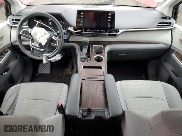 2021 Toyota Sienna LE с VIN 5TDKRKEC8MS065338, выставлен на аукционе Copart как лот 55224075 с пробегом 58 874 миль миль и Списание • Salvage title. История ставок и продаж доступна на DreamBid. Изображение 8.