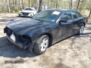2014 Dodge Charger SE with VIN 2C3CDXBG3EH129796, listed as a IAAI auction lot 41773595 with 172,990 mi miles and . Bid and sale history available at DreamBid. Image 2.