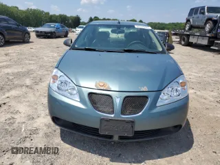 2009 Pontiac G6 1SA with VIN 1G2ZG57B294112753, listed as a Copart auction lot 60333295 with 172,422 mi miles and Salvage title. Bid and sale history available at DreamBid. Image 5.