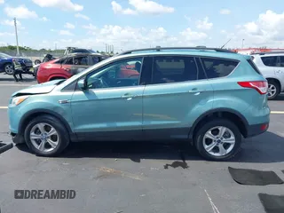 2013 Ford Escape SE with VIN 1FMCU9GX0DUC75662, listed as a IAAI auction lot 42549360 with 156,666 mi miles and . Bid and sale history available at DreamBid. Image 14.