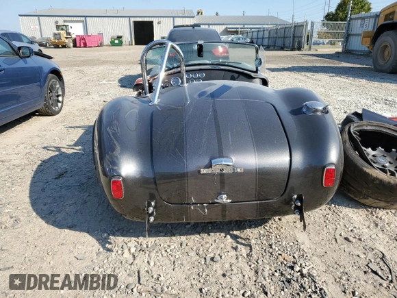 2022 Ford Mustang with VIN ME7700, listed as a Copart auction lot 71374354 with Not provided miles and Salvage title. Bid and sale history available at DreamBid. Image 6.