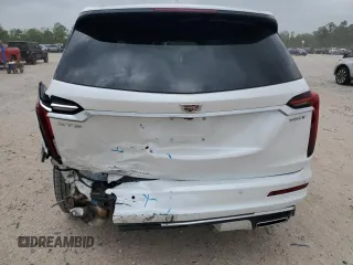 2024 Cadillac XT6 FWD Luxury with VIN 1GYKPAR47RZ720446, listed as a Copart auction lot 51762695 with 10,728 mi miles and Salvage Title. Bid and sale history available at carsss.com. Image 6.