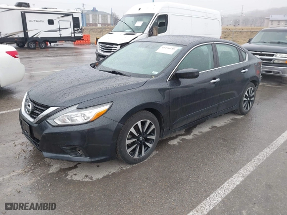 2018 Nissan Altima 2.5 SR with VIN 1N4AL3AP3JC165989, listed as a IAAI auction lot 41490589 with 84,879 mi miles. Bid and sale history available at carsss.com. Image 18.